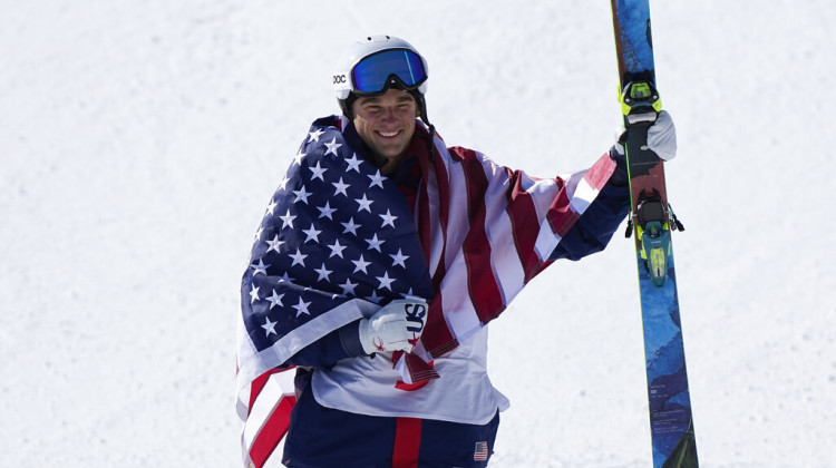 Silver medal winner United State's Nick Goepper celebrates during the venue award ceremony for the men's slopestyle finals at the 2022 Winter Olympics, Wednesday, Feb. 16, 2022, in Zhangjiakou, China. - (AP Photo/Gregory Bull)