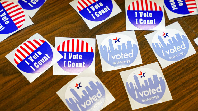 Stickers await voters during primary election voting in Indianapolis, Tuesday, May 3, 2022. - AP Photo/Michael Conroy