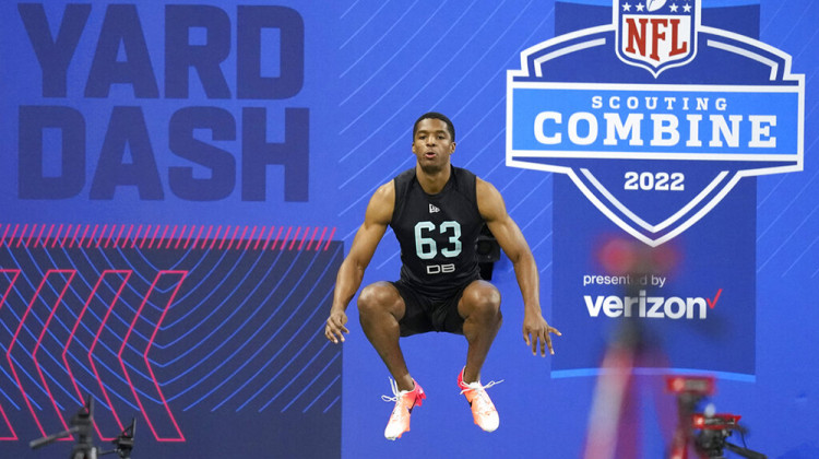 FILE - Baylor defensive back JT Woods prepares to run the 40-yard dash at the NFL football scouting combine, Sunday, March 6, 2022, in Indianapolis. Indianapolis will be keeping the NFL scouting combine for the next two years. - AP Photo/Charlie Neibergall, File