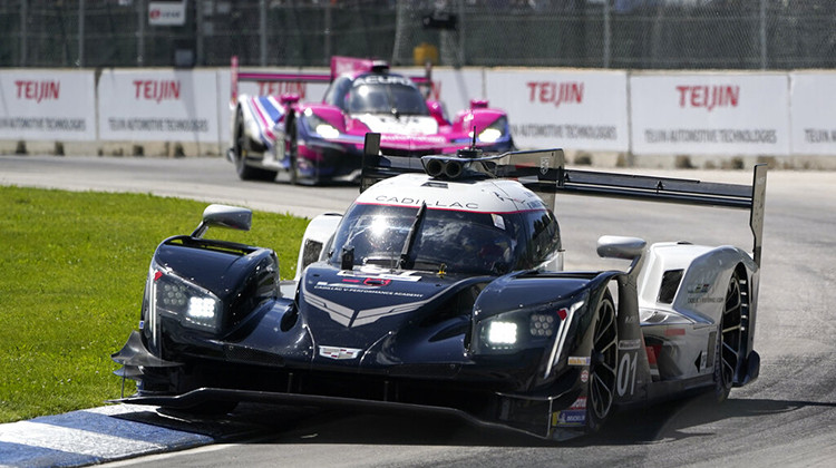 Sebastien Bourdais races his DPi class car during the IMSA Sports Cars Championship auto race on Belle Isle in Detroit, Saturday, June 4, 2022.  - AP Photo/Paul Sancya