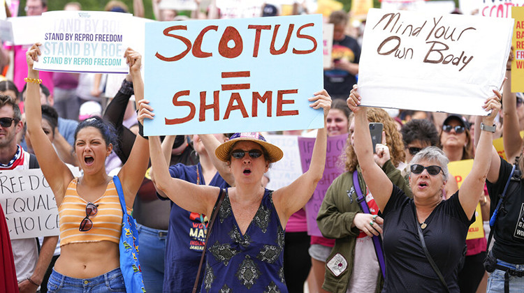 Abortion-rights activist rally at the Indiana Statehouse following Supreme Court's decision to overturn Roe v. Wade, Saturday, June 25, 2022 in Indianapolis. The U.S. Supreme Court on Friday overturned Roe v. Wade, the 1973 decision that had provided a constitutional right to abortion. The ruling is expected to lead to abortion bans in roughly half the states, although the timing of those laws taking effect varies.  - AP Photo/AJ Mast