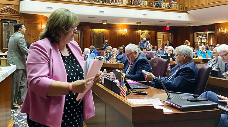 Indiana Republican Rep. Karen Engleman, center, yields to Democratic Rep. Ryan Hatfield, left, during a house session, Thursday, Aug. 4, 2022, in Indianapolis, when lawmakers failed to strip exceptions for rape and incest in a Senate-approved abortion ban being considered by the Indiana House.  - AP Photo/Arleigh Rodgers