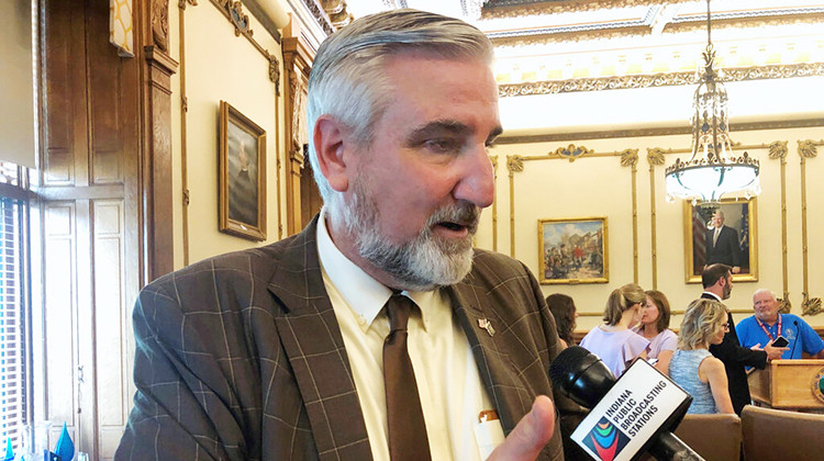 Indiana Gov. Eric Holcomb speaks with reporters following an event in his office at the Indiana Statehouse in Indianapolis, on Wednesday, Sept. 14, 2022, about the state's abortion ban that took effect Thursday. An Indiana judge turned down on Thursday a request to block enforcement of the ban as part of a lawsuit arguing that the state constitution protects access to abortion. - AP Photo/Tom Davies