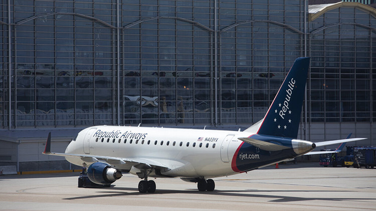 FILE - A Republic Airways jet is seen at Ronald Reagan Washington National Airport in Arlington, Va., June 2, 2021. Federal officials have rejected a request by Republic, which is facing a pilot shortage, to hire co-pilots with half the usual minimum amount of flying experience, saying it would reduce safety.  - AP Photo/Jenny Kane, File