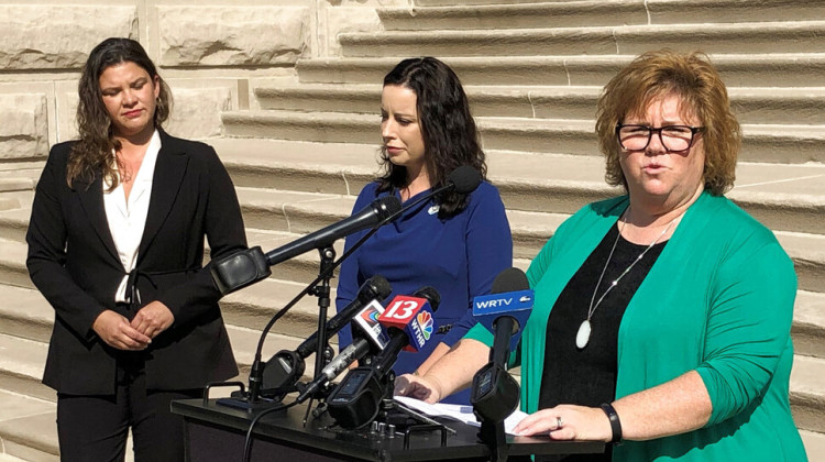 Indiana Democratic legislative candidate Joey Mayer, right, speaks during a news conference outside the Indiana Statehouse in Indianapolis on Sept. 15, 2022. Democrats such as Mayer are hoping to win legislative seats in the Nov. 8, 2022 election over Republicans who supported Indiana's abortion ban law that was approved in August. - AP Photo/Tom Davies