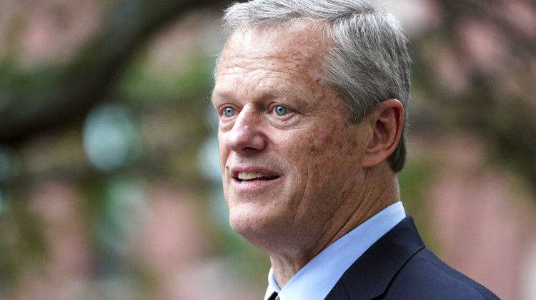 FILE - Massachusetts Gov. Charlie Baker speaks during a Juneteenth commemoration in Boston's Nubian Square, June 18, 2021. Charlie Baker will be the next president of the NCAA, replacing Mark Emmert as the head of the largest college sports governing body in the country. - AP Photo/Elise Amendola, File