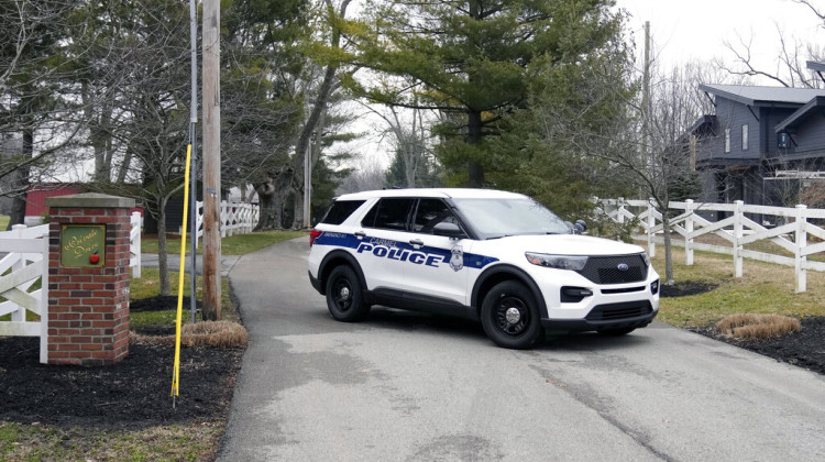 Police secure the entrance to the neighborhood of former Vice President Mike Pence's Indiana home, Friday, Feb. 10, 2023 in Carmel, Ind. The FBI is searching former Vice President Mike Pence’s Indiana home as part of a classified records probe. That's according to two people familiar with the search who were not authorized to discuss it and spoke on condition of anonymity.  - AP Photo/Michael Conroy