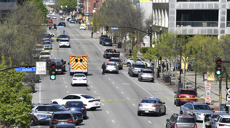 Louisville metro Police and emergency personnel block the streets outside of the Old National Bank building in Louisville, Ky., Monday, April 10, 2023. -  AP Photo/Timothy D. Easley
