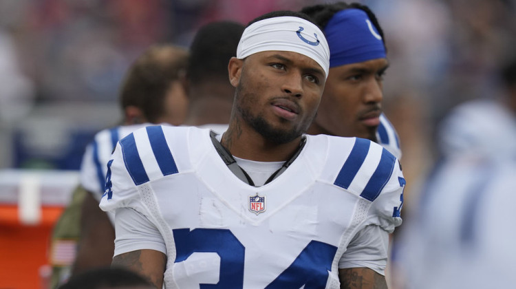 FILE - Indianapolis Colts cornerback Isaiah Rodgers Sr. (34) stands on the sideline during an NFL football game against the New England Patriots on Nov. 6, 2022, in Foxborough, Mass. Rodgers did not practice with his teammates Wednesday, June 7, 2023, two days after the team said it was aware of an NFL investigation into gambling allegations about one of its players.  - AP Photo/Charles Krupa, File