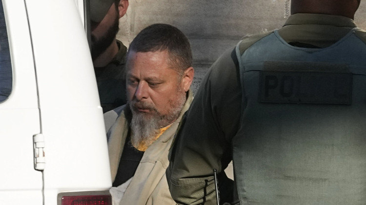 Officers escort Richard Matthew Allen out of the Carroll County courthouse following a hearing, Nov. 22, 2022, in Delphi, Ind. Allen confessed multiple times to the murders of two teenage girls — Abigail Williams, 13, and Liberty German, 14 — he is charged with killing in a phone call to his wife while in prison, according to court documents released Wednesday, June 28, 2023.  - AP Photo/Darron Cummings, File