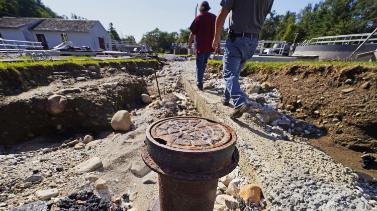 A sewer pipe is exposed due to eroded land at the wastewater treatment plant following July flooding, Wednesday, Aug. 2, 2023, in Ludlow, Vt. Across the U.S., municipal water systems and sewage treatment plants are at increasing risk of damage from floods and sea-level rise brought on in part or even wholly by climate change. The storm that walloped Ludlow especially hard, damaging the picturesque ski town’s system for cleaning up sewage before it’s discharged into the Williams River - AP Photo/Charles Krupa