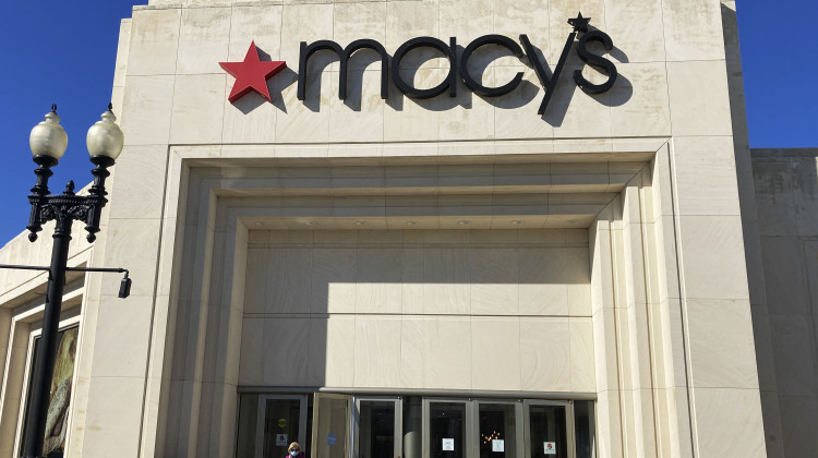 A shopper exits Macy's at the Woodfield Old Orchard Shopping Center in Skokie, Ill., Saturday, Feb. 19, 2022. Macy's reports earnings on Tuesday, Aug. 12, 2023. - AP Photo/Nam Y. Huh, File