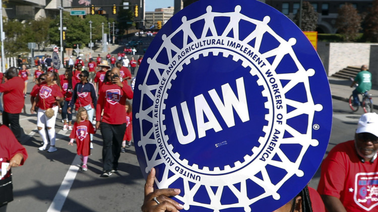 United Auto Workers members walk in the Labor Day parade in Detroit, Sept. 2, 2019. The tentative contract agreement between General Motors and the United Auto Workers union appears to be headed for defeat. The union hasn’t posted final vote totals yet, but workers at five large factories who finished voting in the past few days have turned down the four year and eight month deal by fairly large margins. - AP Photo/Paul Sancya, File