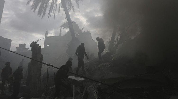 Palestinians look for the survivors of an Israeli strike in Rafah, Gaza Strip, Thursday, Nov. 14, 2023. - (AP Photo/Hatem Ali)