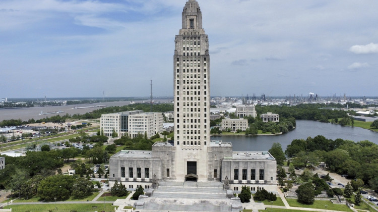 The Louisiana Capitol stands prominently, April 4, 2023, in Baton Rouge, La. Louisiana officials are debating the possible sale of the state's largest non-profit health insurer, Blue Cross Blue Shield of Louisiana. - AP Photo/Stephen Smith, File