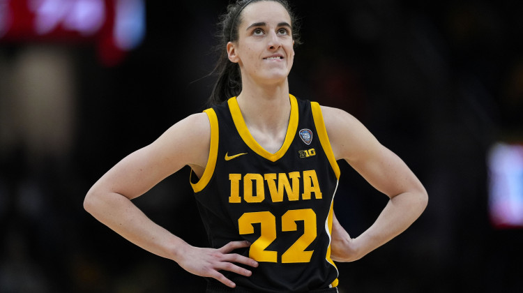 Iowa guard Caitlin Clark stands on the court during the second half of the Final Four college basketball championship game against South Carolina in the women's NCAA Tournament, Sunday, April 7, 2024, in Cleveland. - AP Photo / Carolyn Kaster