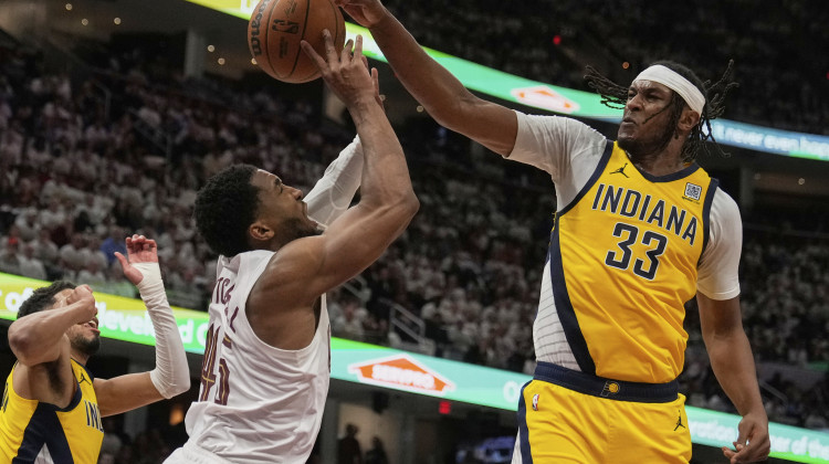 Indiana Pacers' Myles Turner (33) blocks a shot by Cleveland Cavaliers guard Donovan Mitchell, center, in the second half during Game 2 in the Eastern Conference semifinals of the NBA basketball playoffs Tuesday, May 6, 2025, in Cleveland. - AP Photo/Sue Ogrocki