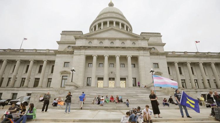 On Tuesday, June 20, 2023, a federal judge blocked Arkansas' ban on gender-affirming care for minors. In this photo, opponents of a religious freedom bill gather at the Arkansas state Capitol in Little Rock, Ark., Thursday, April 2, 2015.  - Danny Johnston/AP