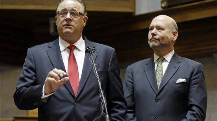 Indiana Senate President Pro Tem David Long, left, R-Fort Wayne, and House Speaker Brian C. Bosma R-Indianapolis, discuss their plans for clarifying the Indiana Religious Freedom Restoration Act during a news conference at the Statehouse in Indianapolis, Monday, March 30, 2015. - The Associated Press