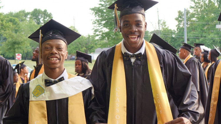 "You about to graduate high school, you have to be hyped," said Lyriq Spencer before he and Bernard Spencer, left, walked into Arlington Community High School on Thursday, June 7, 2018 for the 2018 commencement ceremony. - Eric Weddle/WFYI