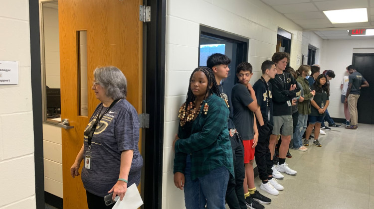 Purdue Polytechnic High School students line up in the Broad Ripple High School building on the first day of school at the charter network's north campus in 2022. The network has two campuses in Indianapolis and plans to open a third. - Amelia Pak-Harvey / Chalkbeat