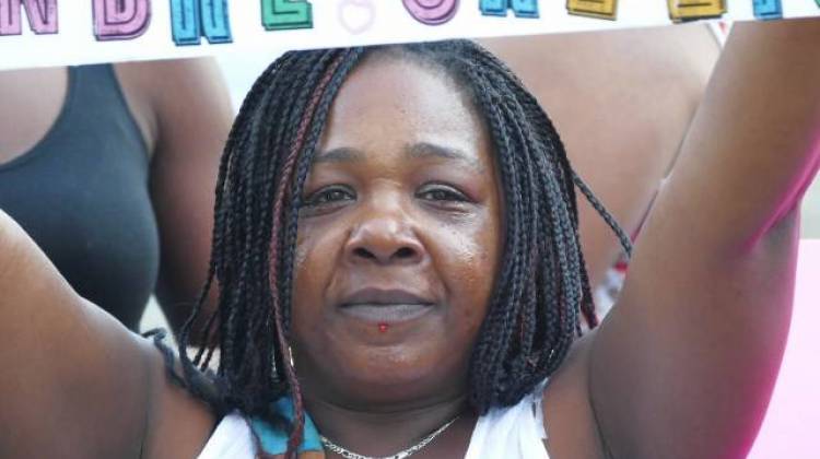 Monica Lamb, an aunt of Andre Green at a vigil Tuesday night. - Ryan Delaney/WFYI