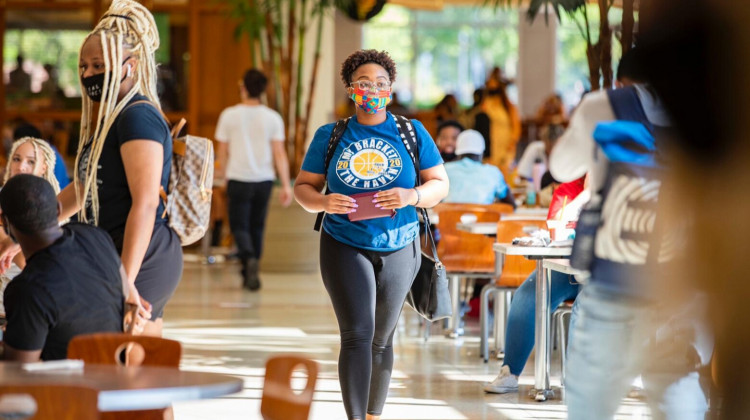 Ball State students eat and talk in a dining hall during the first week of classes. - Ball State University via Facebook