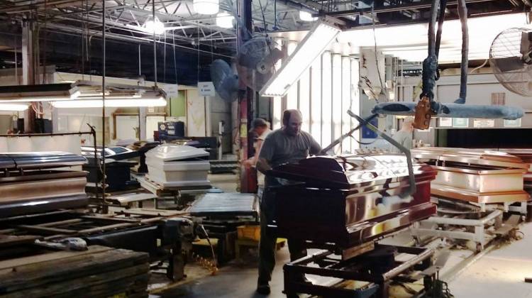 A worker assembles caskets on a factory floor in Batesville. - Annie Ropeik/IPB file photo