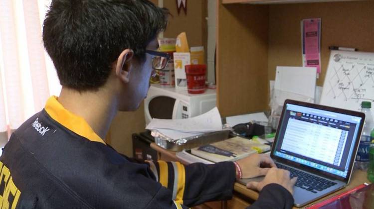 IU student Ben Segelbaum scrolls through Draft Kings, a daily fantasy sports site. - Harrison Wagner/WFIU-WTIU