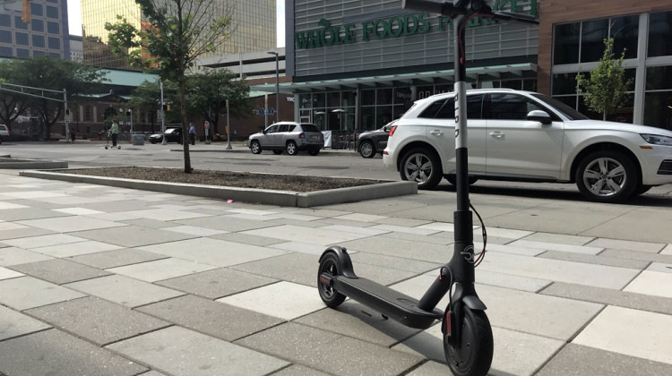 Companies like Bird and Lime dropped hundreds of scooters, like this one in Indianapolis, in several Indiana communities last year. - FILE PHOTO: Drew Daudelin/WFYI News