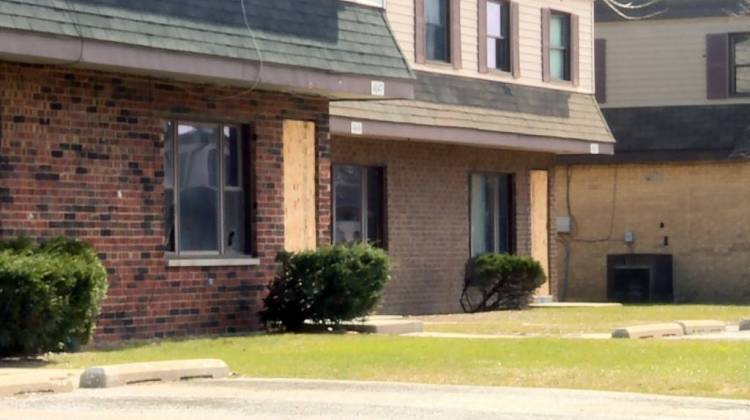 Some homes in West Calumet Housing Complex are already boarded up ahead of Friday's deadline for the 60 or so families left there to move out. - Lauren Chapman/IPB