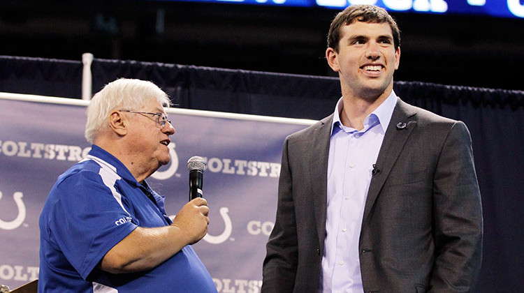 Indianapolis Colts announcer Bob Lamey  interviews quarterback Andrew Luck, at a draft party in Lucas Oil Stadium after Luck was introduced by the team, Friday, April 27, 2012.  - AP Photo/Michael Conroy