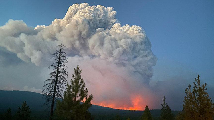 Smoke from the Bootleg Fire rises in Oregon. Smoke from wildfires in the western U.S. and southern Canada is drifting east and reducing air quality thousands of miles away. - Freemont-Winema National Forest/National Interagency Fire Center