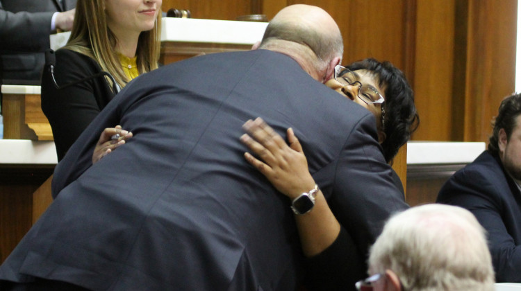 Rep. Brian Bosma (R-Indianapolis) and Rep. Cherrish Pryor (D-Indianapolis) embrace on the House floor. - Lauren Chapman/IPB News