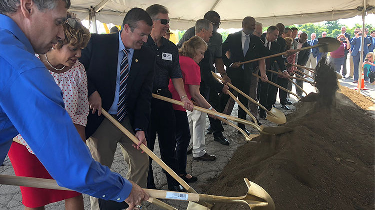 City-County Councilors shovel dirt at the groundbreaking ceremony for the new Community Justice Campus. The City-County Council unanimously approved the acquisition of the land from Citizens Energy Group. - Sarah Panfil/WFYI