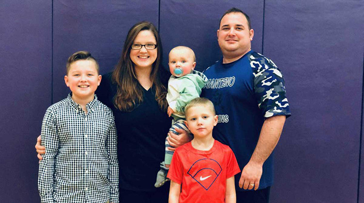 Health care workers Brittanny and Bryce Budimir live in Kankakee, Illinois, and have three children. This photo was taken before the COVID-19 pandemic prompted them to send their children to live with their grandparents. - Courtesy of Brittanny Budmir