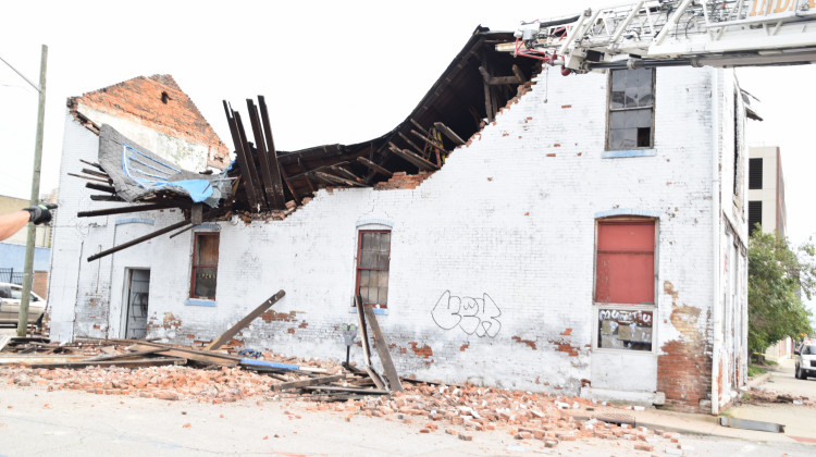 An Indianapolis firefighter was slightly injured Monday during the rescue of a man from this partially collapsed building.  - Provided by Indianapolis Fire Department