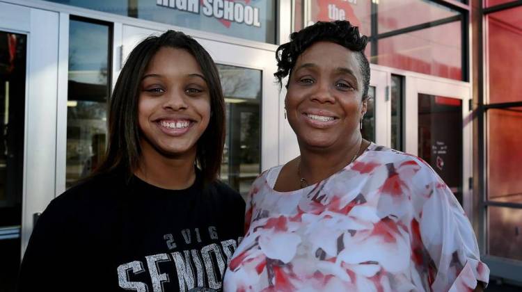 LaTonya Kirkland, right, and her daughter LaShawn have been directly affected by Indianapolis' decades-long effort to desegregate the city's schools. LaTonya was part of the first class of students to be bused to Perry Township from IPS back in the 1980s, and LaShawn was in the last class. She graduated this spring from Southport High School.  - Photo by Indy Star