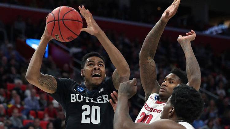 Butler guard Henry Baddley (20) prepares to shoot against Arkansas during the first half of a first-round game in the NCAA college basketball tournament, Friday, March 16, 2018, in Detroit.  - AP Photo/Carlos Osorio