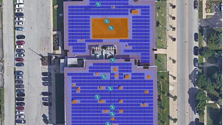 In this artist rendering, solar panels are added to the roof of Butler Lab School 60 in the Indianapolis Public School district. The panels are expected to offset the building's power by 82 percent as part of a district wide plan to add solar panels to 20 school facilities. - Courtesy of Sun FundED, Indianapolis Public Schools