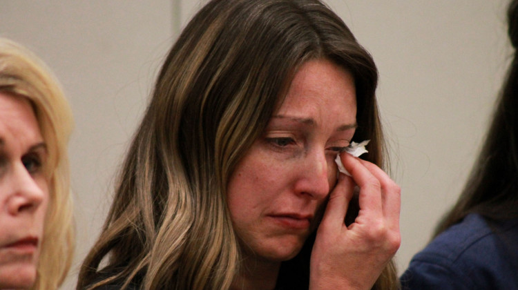 Photo caption: Dr. Caitlin Bernard got emotional as the Indiana Medical Licensing Board discussed charges and sanctions against her at a hearing on Friday, May 26, 2023.  - Brandon Smith/IPB News