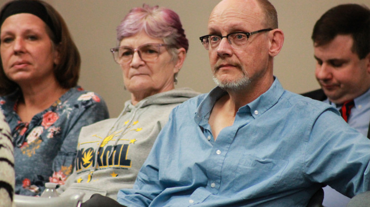 Keith Johnson, right, is an Indiana hemp producer. He sits in the audience during a committee hearing at the Statehouse on Wednesday, Feb. 15, 2023 for a bill to decriminalize possession of two ounces or less of cannabis.  - Brandon Smith/IPB News
