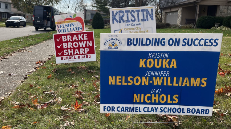Campaign signs for Carmel Clay School Board candidates who are running in the 2022 primary election. Three seats on the five-member board are up on the ballot. - Jill Sheridan/WFYI