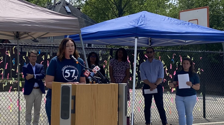 Cassandra Crutchfied, mother or 7-year-old Hannah Crutchfield who was killed by a vehicle last fall, speaks at George W. Julian School 57 in Irvington on Wednesday, May 11, 2022 about a crowdfunding campaign to rebuild the school’s playground in honor of the first grader. - (Elizabeth Gabriel/WFYI)