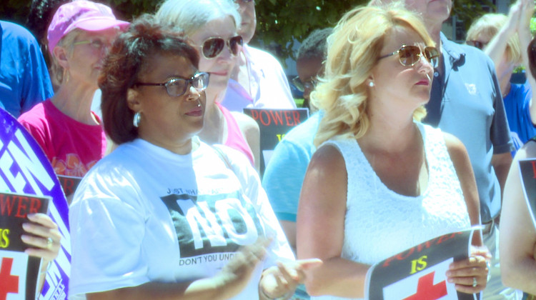 Reps. Cherrish Pryor (D-Indianapolis) and Karlee Macer (D-Indianapolis) joined the protest at the statehouse Saturday. (Lauren Chapman/IPB News)