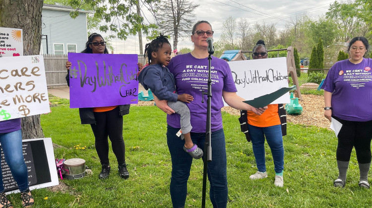 Kelly Dawn Jones speaks at the Day Without Child Care protest, held at her in-home child care business on Indianapolis' southeast side. She said the child care workforce needs racial justice, thriving wages and affordable care for all families. - Sydney Dauphinais/WFYI