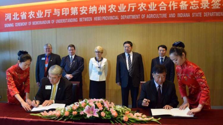 Indiana Department of Agriculture director Ted McKinney (left, seated) signs a friendship agreement with China's Hebei Provincial Department of Agriculture during a trade mission in 2015. - Courtesy office of the Lieutenant Governor