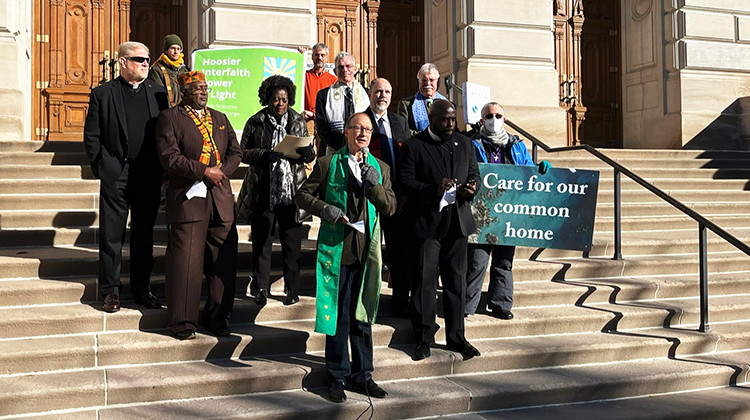 Hoosier faith advocates and leaders petitioned Indiana Gov. Eric Holcomb to address the climate crisis. The group gathered outside the Statehouse Friday to share stories and call for action on climate change in Indiana. - Jill Sheridan/WFYI