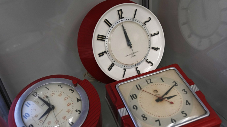 A selection of vintage clocks are displayed at the Electric Time Company, March 9, 2023, in Medfield, Mass. - AP Photo/Charles Krupa