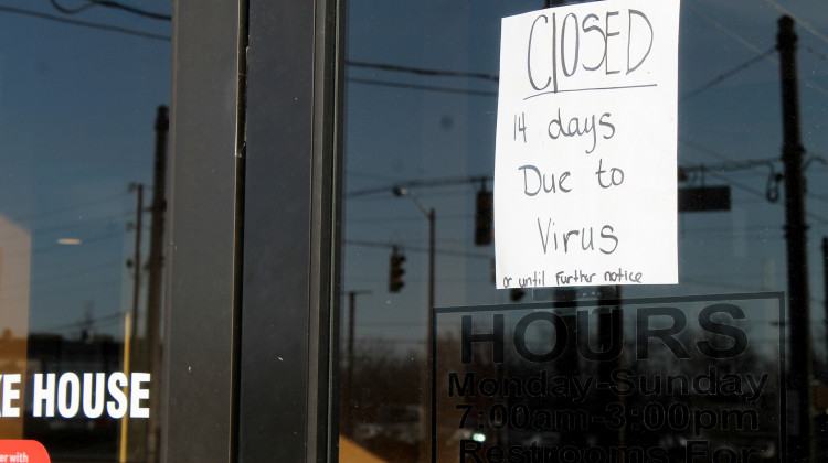 Christina's Pancake House in Indianapolis displays a sign, telling customers they're closed for the next two weeks.  - Lauren Chapman/IPB News